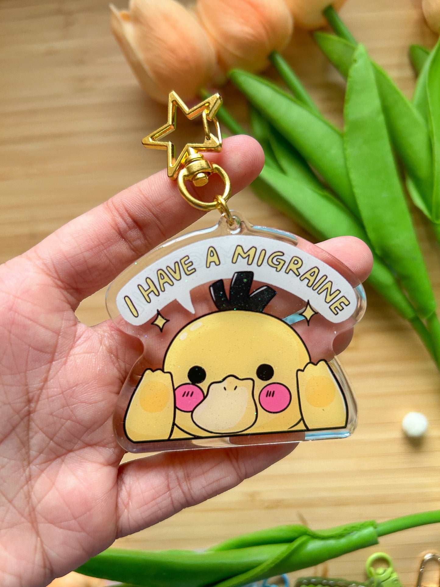 I have a migraine psyduck keychain