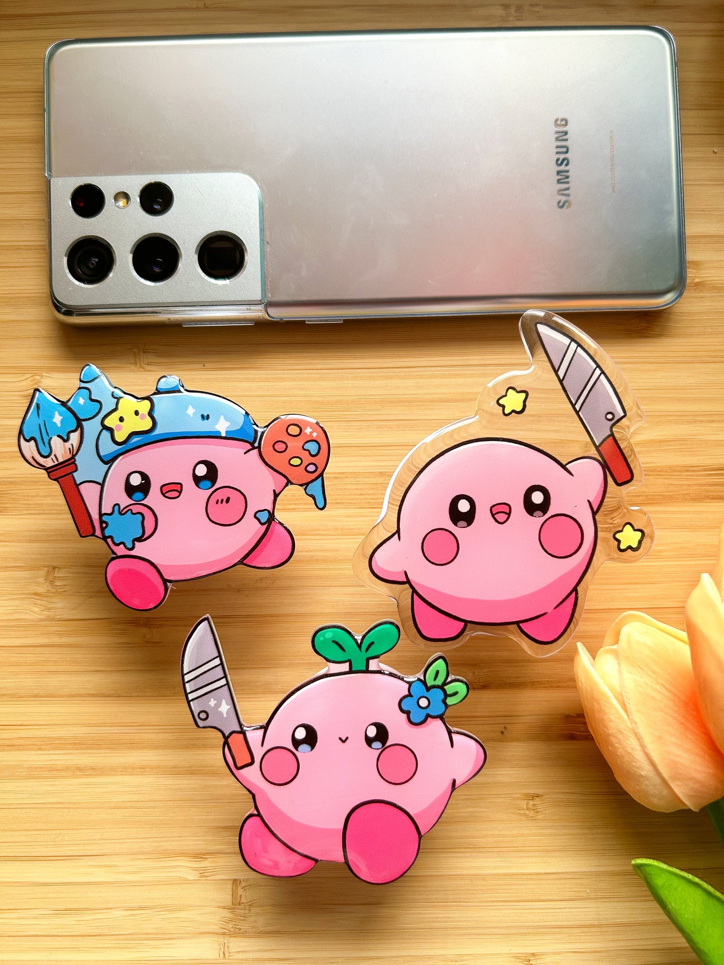 Kirby with knife phone grips
