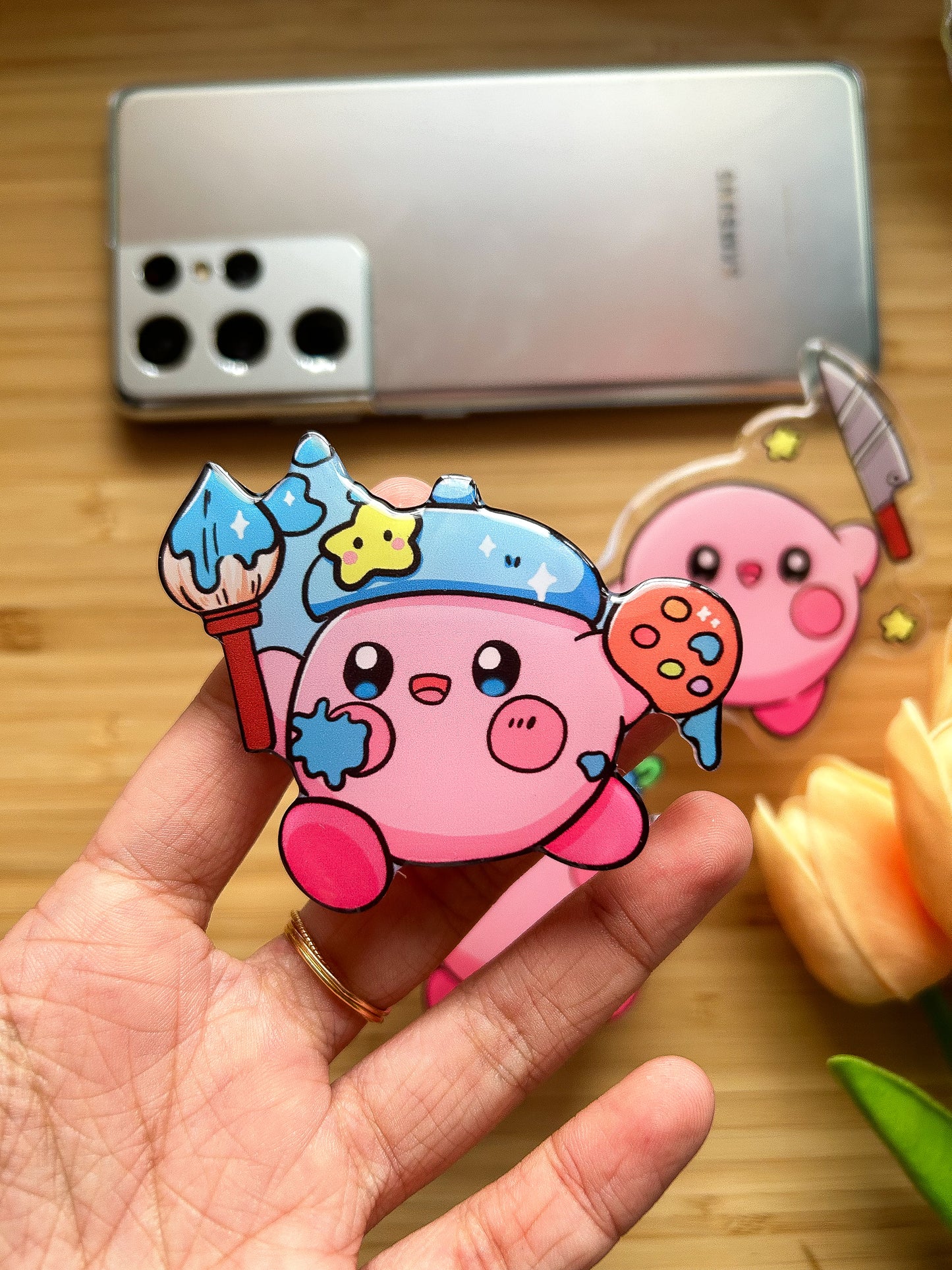 Kirby with knife phone grips