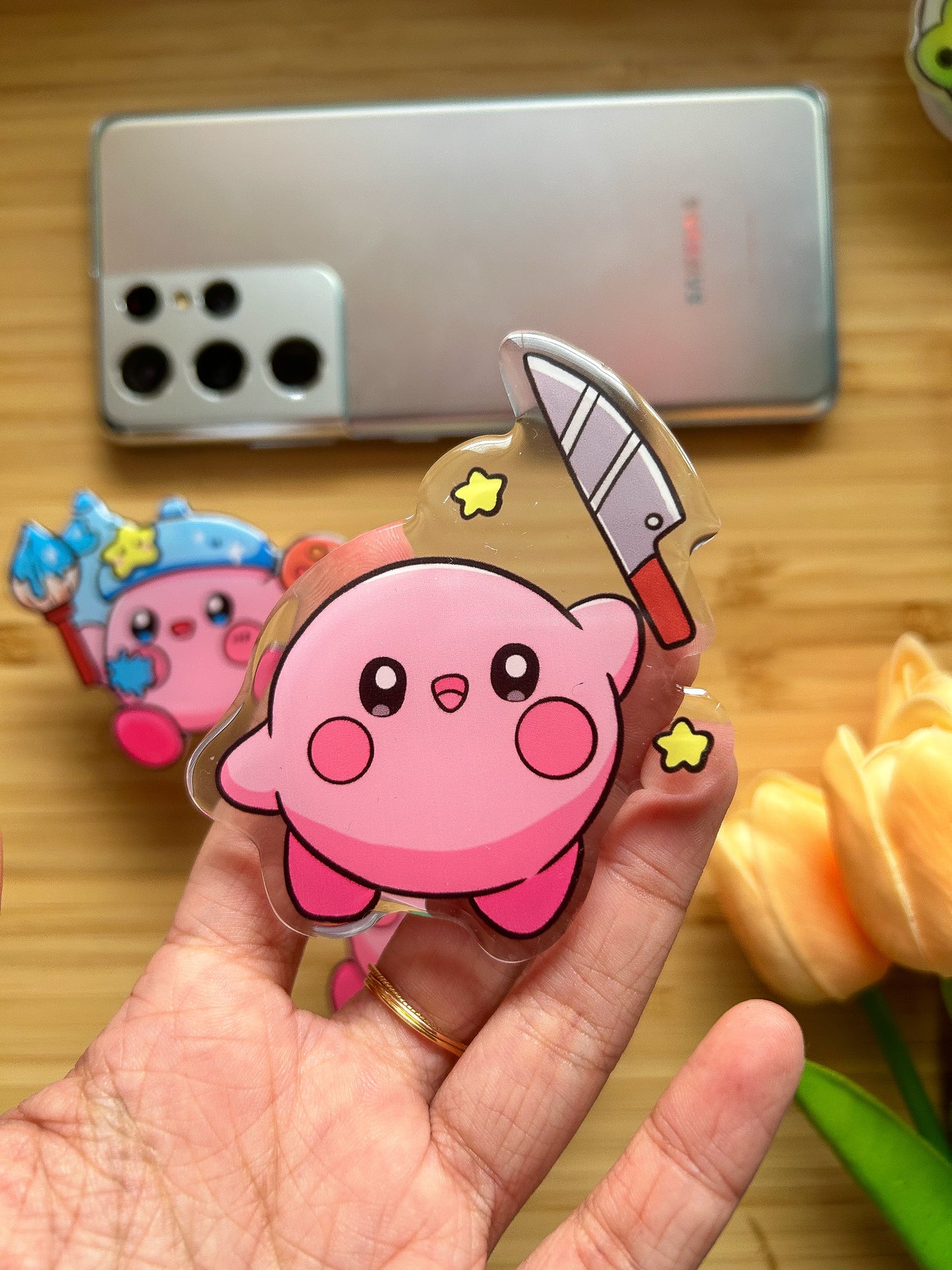 Kirby with knife phone grips