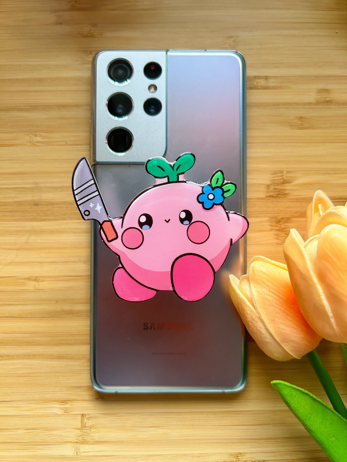 Kirby with knife phone grips
