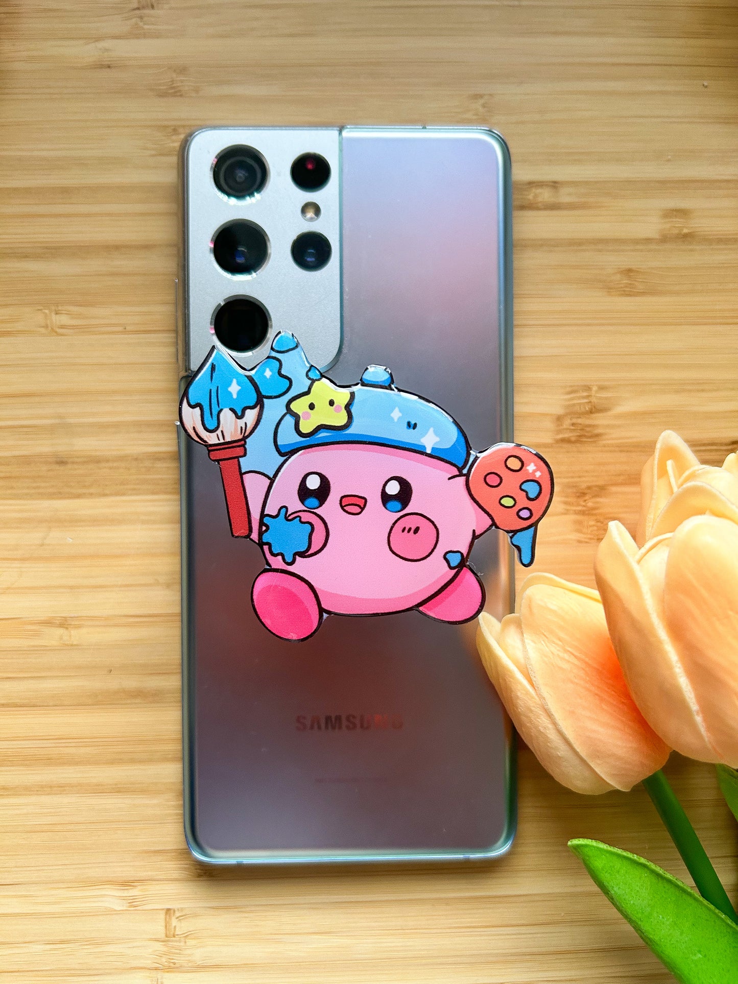 Kirby with knife phone grips